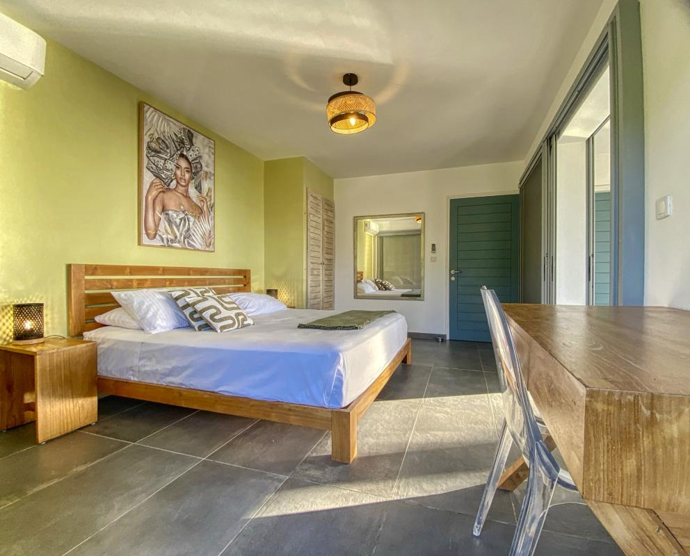 22.Location Villa piscine vue mer Deshaies Guadeloupe_Chambre 1 Rdc